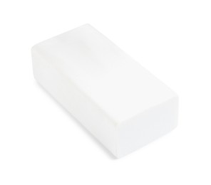 Photo of New eraser isolated on white. School stationery