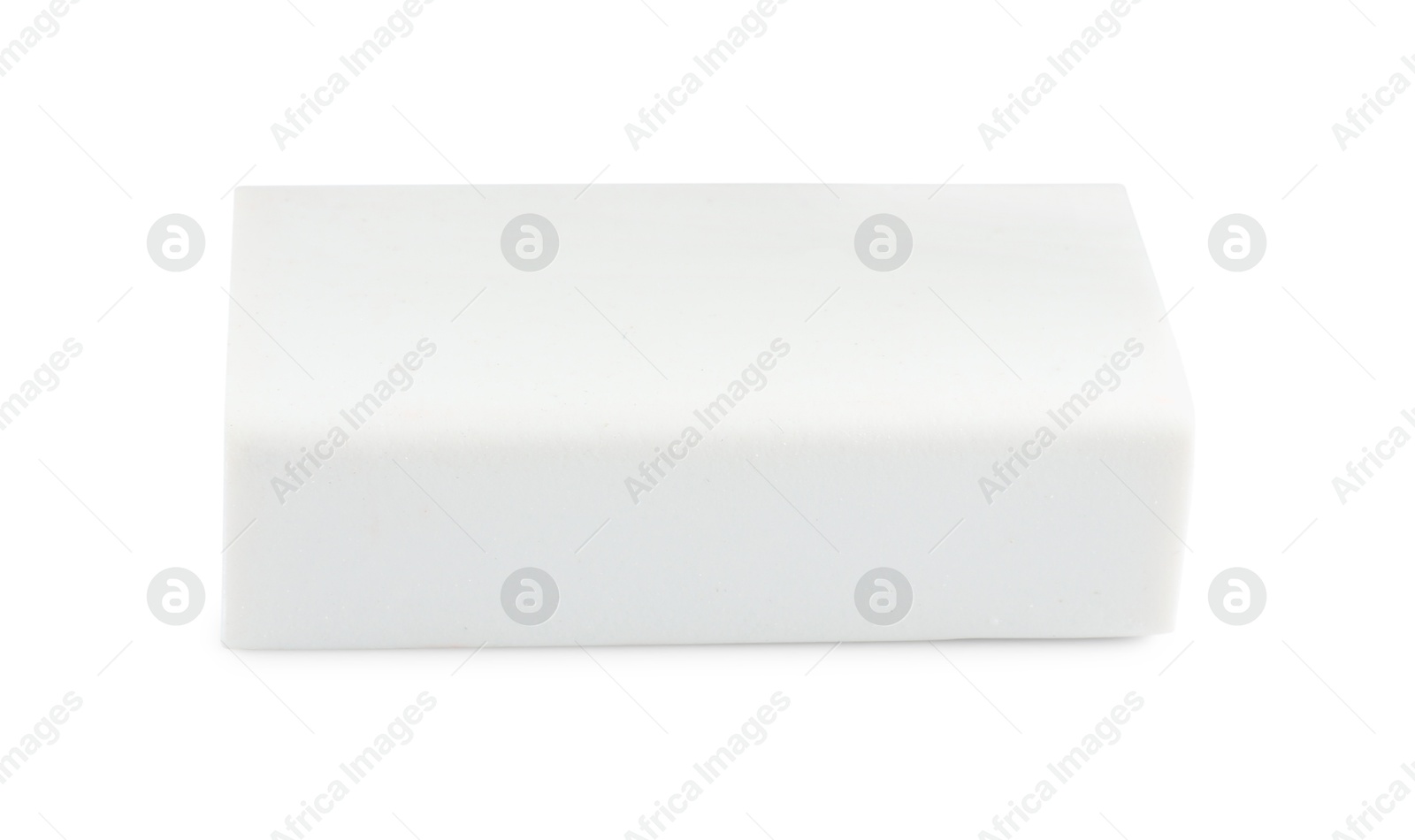 Photo of New eraser isolated on white. School stationery