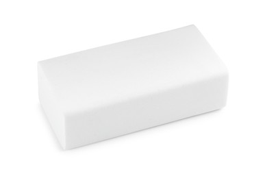 Photo of New eraser isolated on white. School stationery