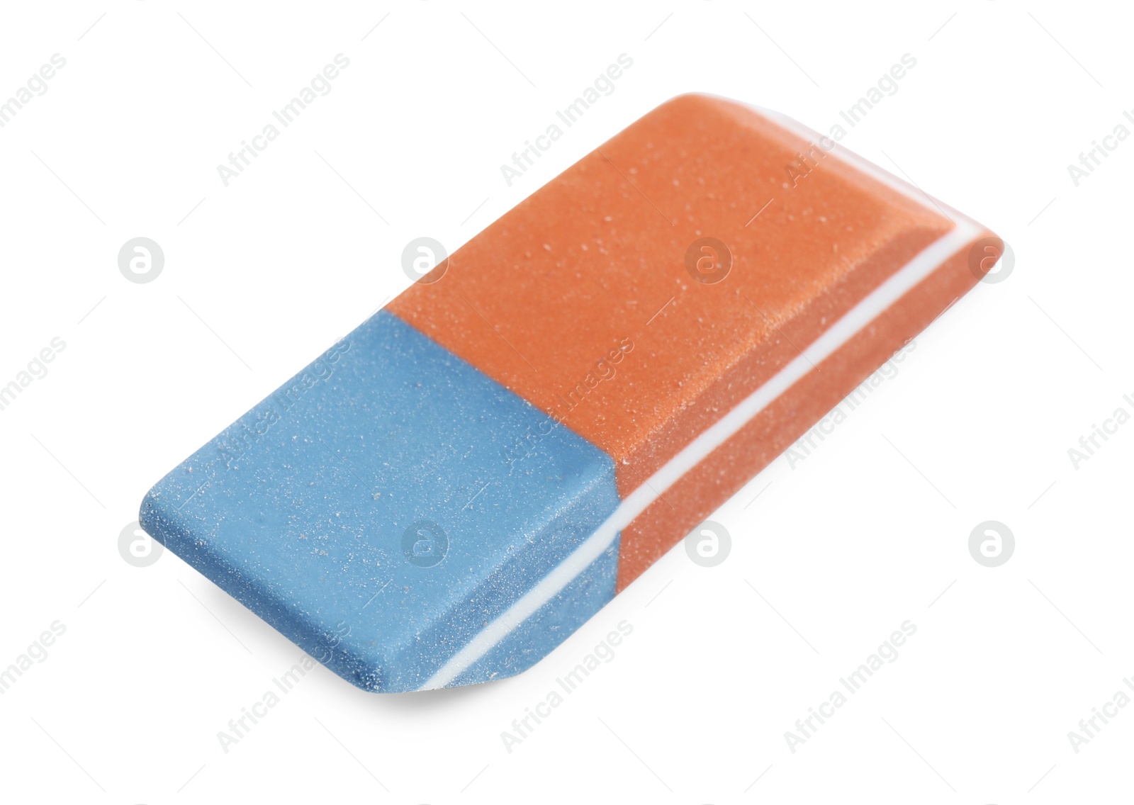 Photo of New eraser isolated on white. School stationery