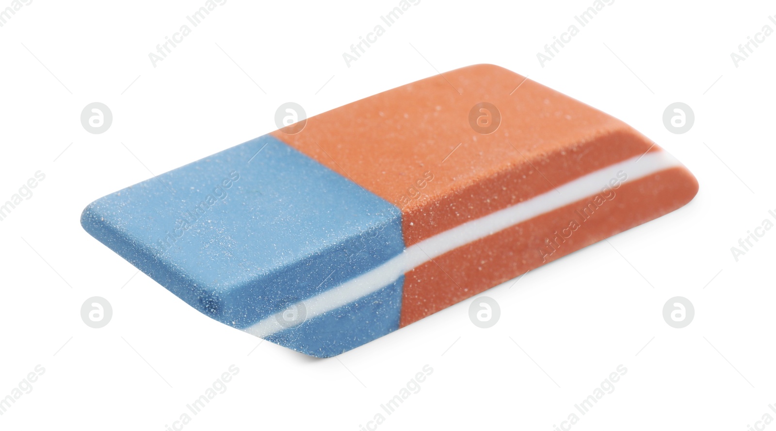 Photo of New eraser isolated on white. School stationery