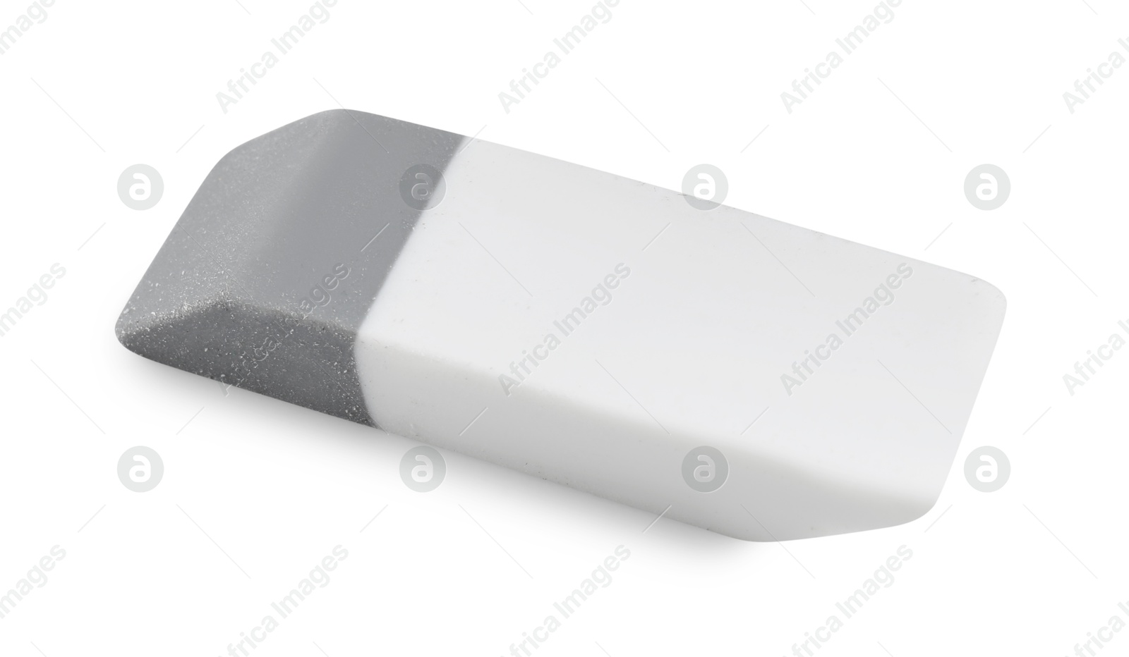 Photo of New eraser isolated on white. School stationery