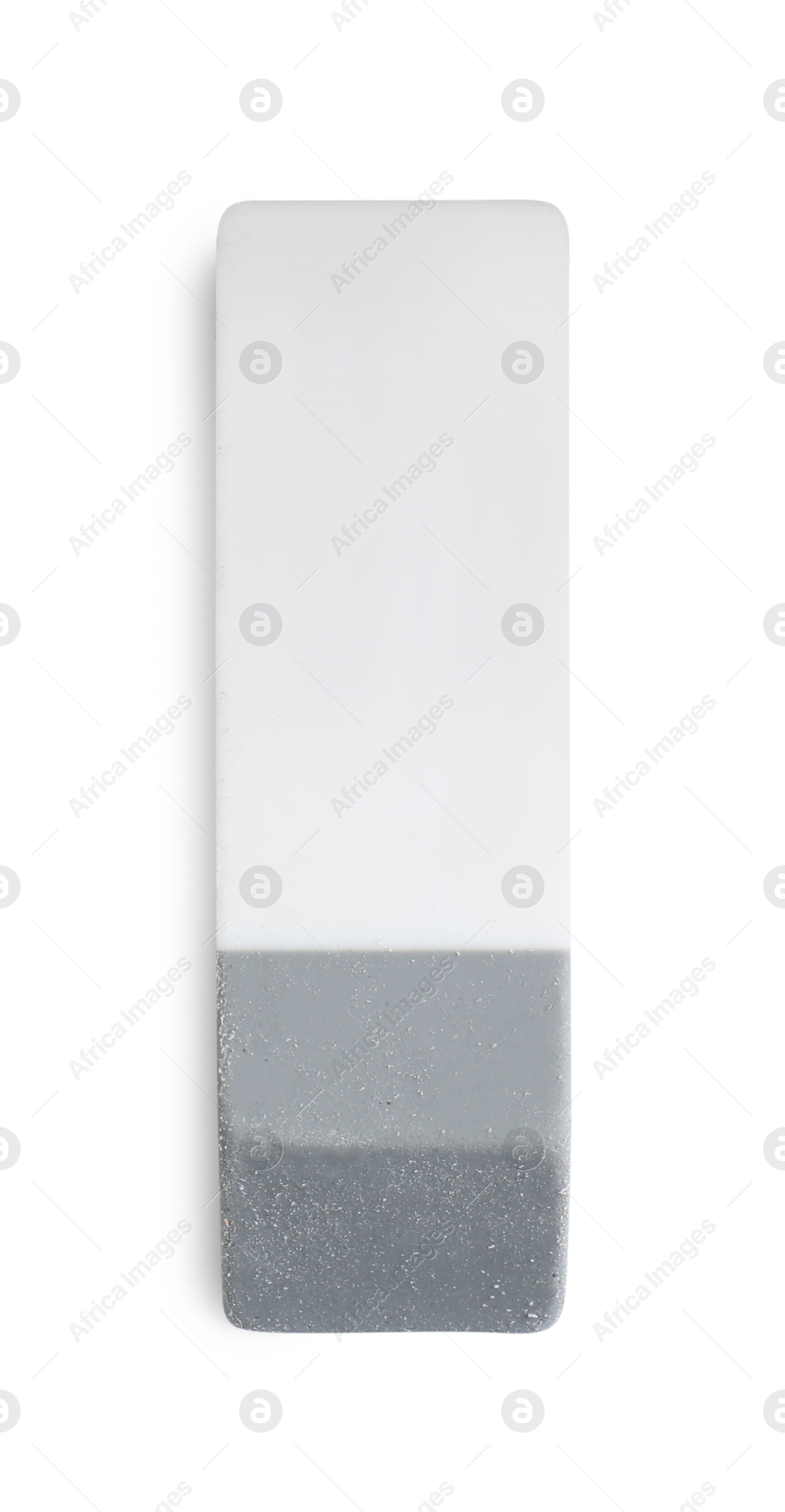 Photo of New eraser isolated on white, top view. School stationery