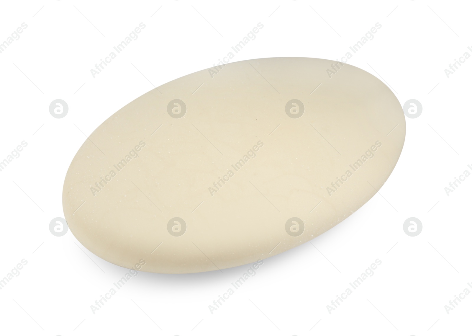 Photo of New eraser isolated on white. School stationery