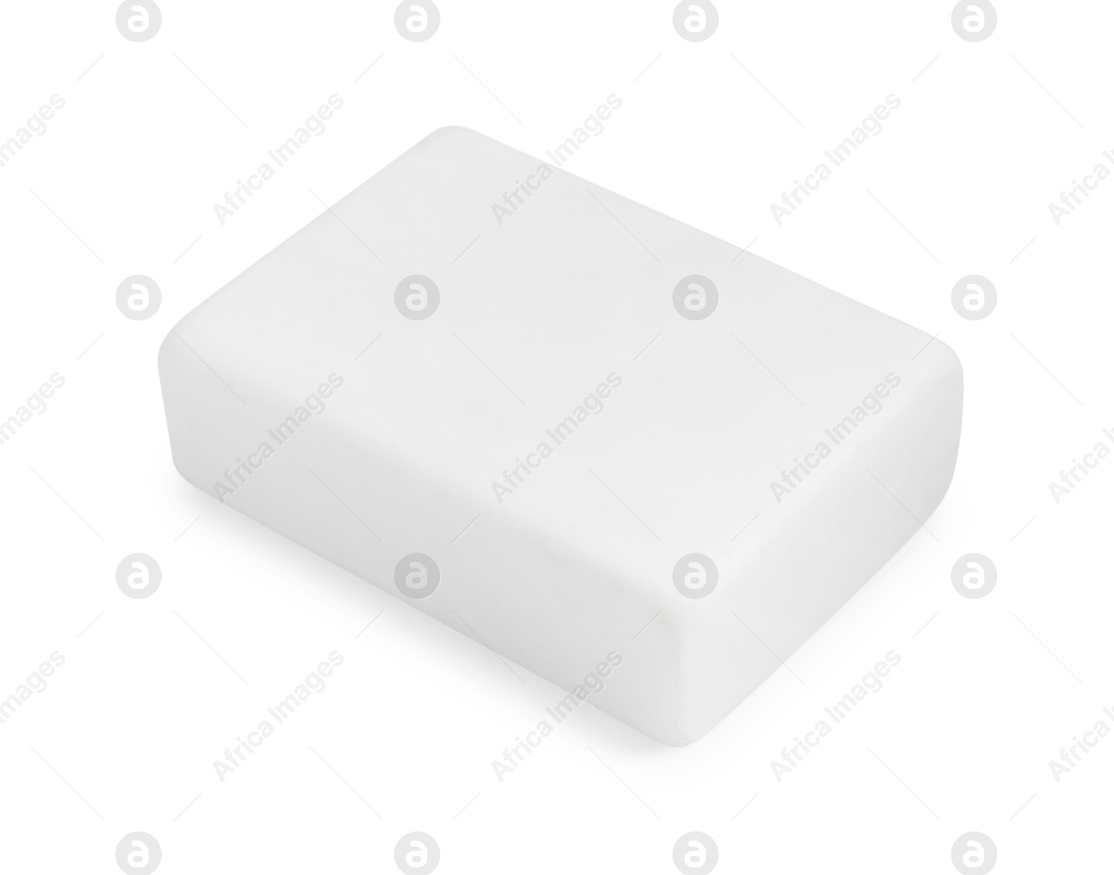 Photo of New eraser isolated on white. School stationery