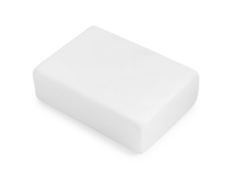 Photo of New eraser isolated on white. School stationery