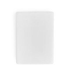 Photo of New eraser isolated on white, top view. School stationery