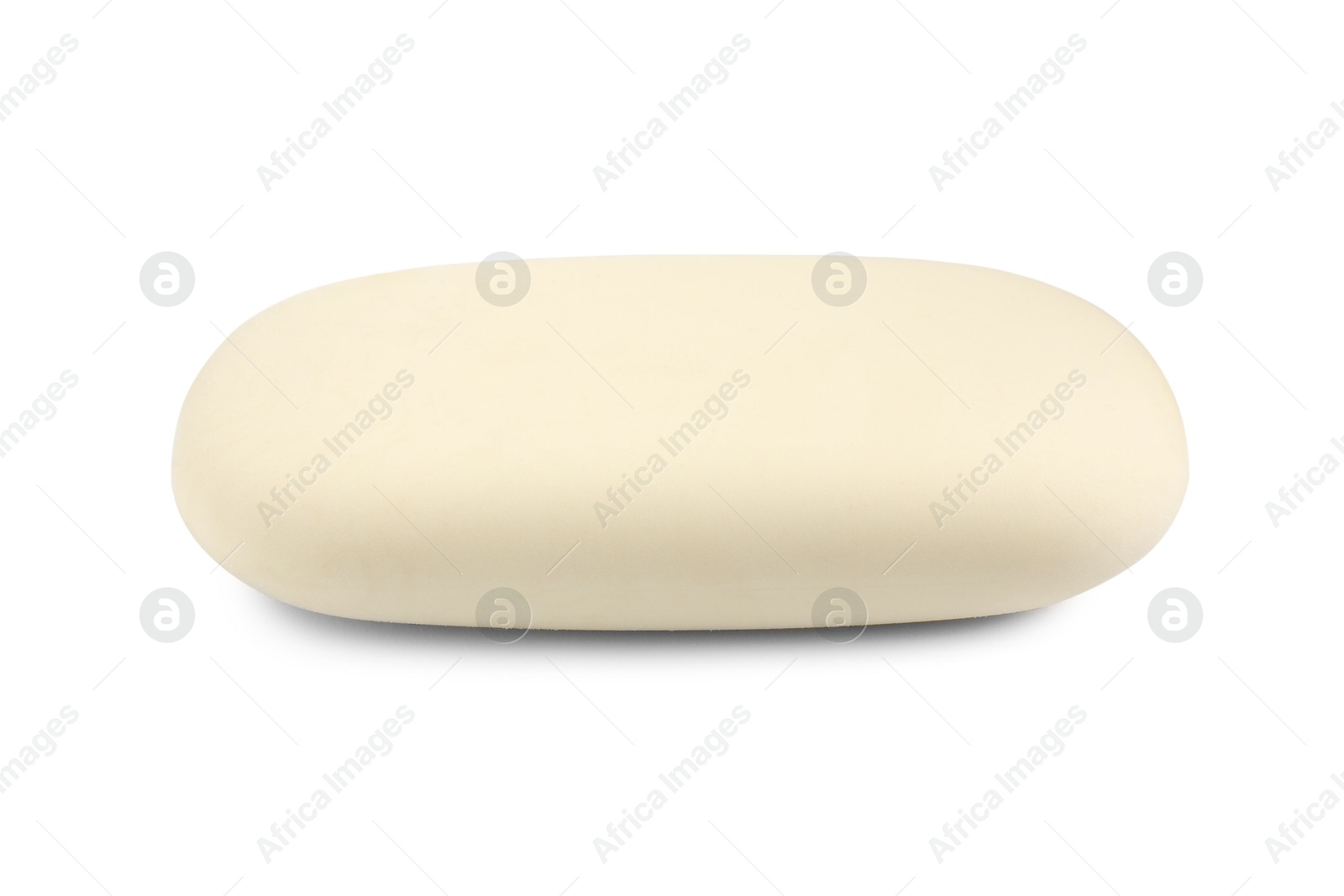 Photo of New eraser isolated on white. School stationery