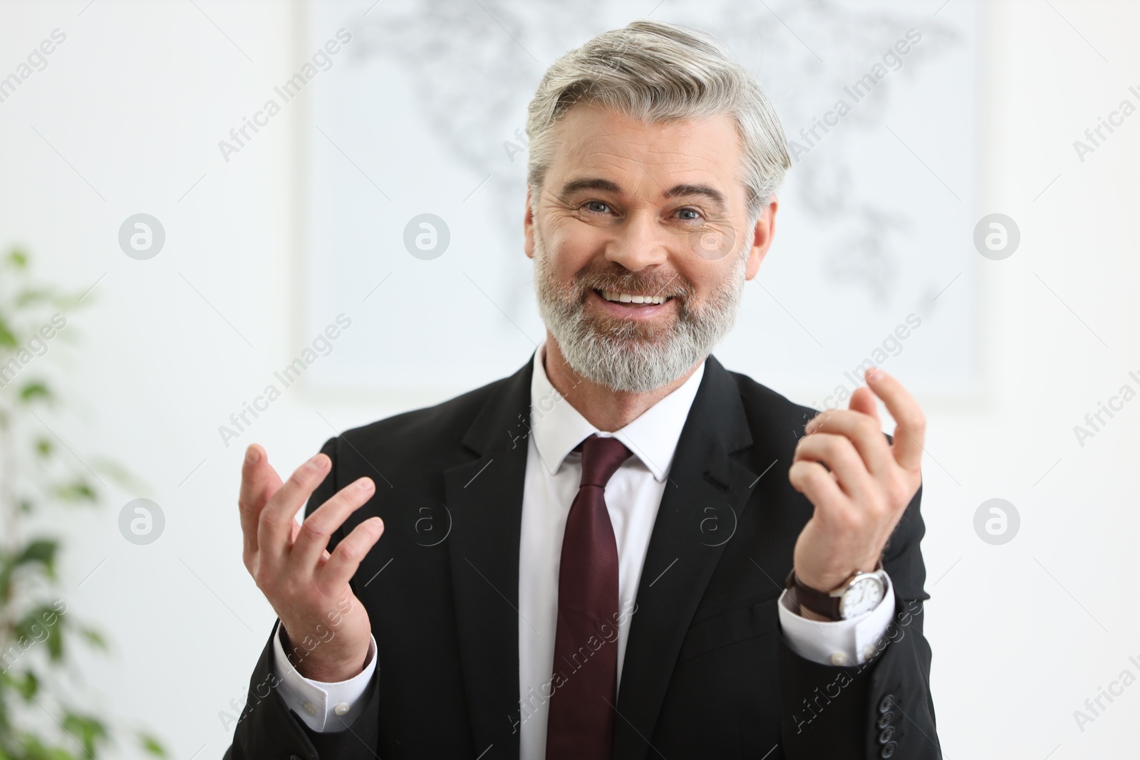 Photo of Portrait of banker in jacket at workplace