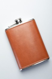 Photo of One hip flask on white background, top view