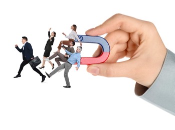 Image of Woman with horseshoe magnet in her hand attracting business people on white background, closeup