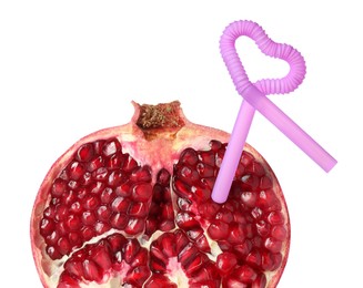 Image of Ripe pomegranate with drinking straw on white background. Organic juice or freshly made smoothie concept