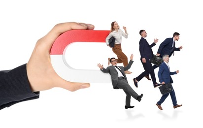 Image of Woman with horseshoe magnet in her hand attracting business people on white background, closeup