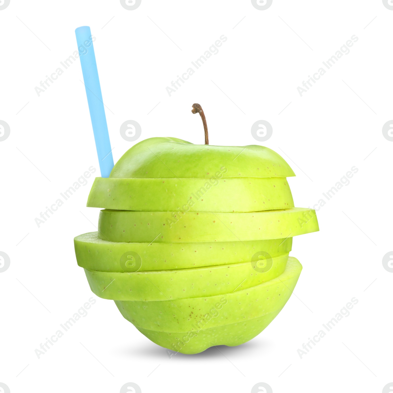 Image of Drinking straw in sliced green apple on white background. Organic juice or freshly made smoothie concept