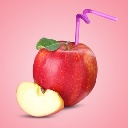 Image of Ripe red apple with drinking straw on pink background. Organic juice or freshly made smoothie concept