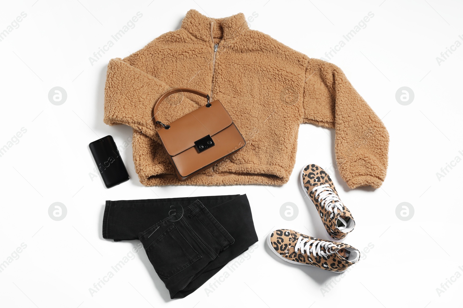 Photo of Stylish outfit with bag on white background, flat lay