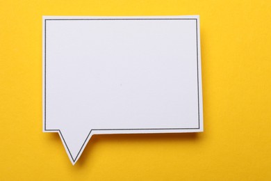 Photo of Blank speech bubble on yellow background. Space for text