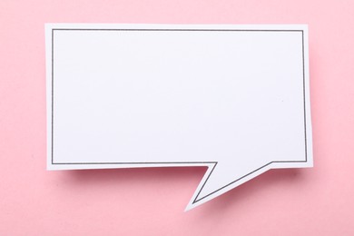 Photo of Blank speech bubble on light pink background. Space for text