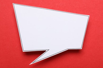 Photo of Blank speech bubble on red background. Space for text