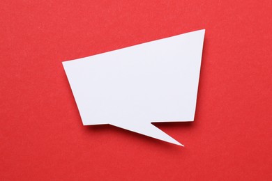 Photo of Blank speech bubble on red background. Space for text