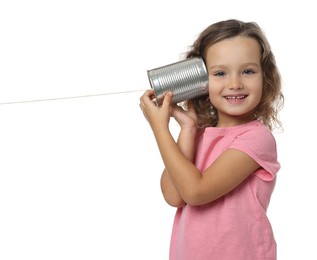 Photo of Girl using tin can telephone on white background