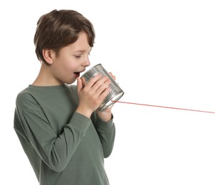 Photo of Boy using tin can telephone on white background