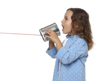 Photo of Girl using tin can telephone on white background