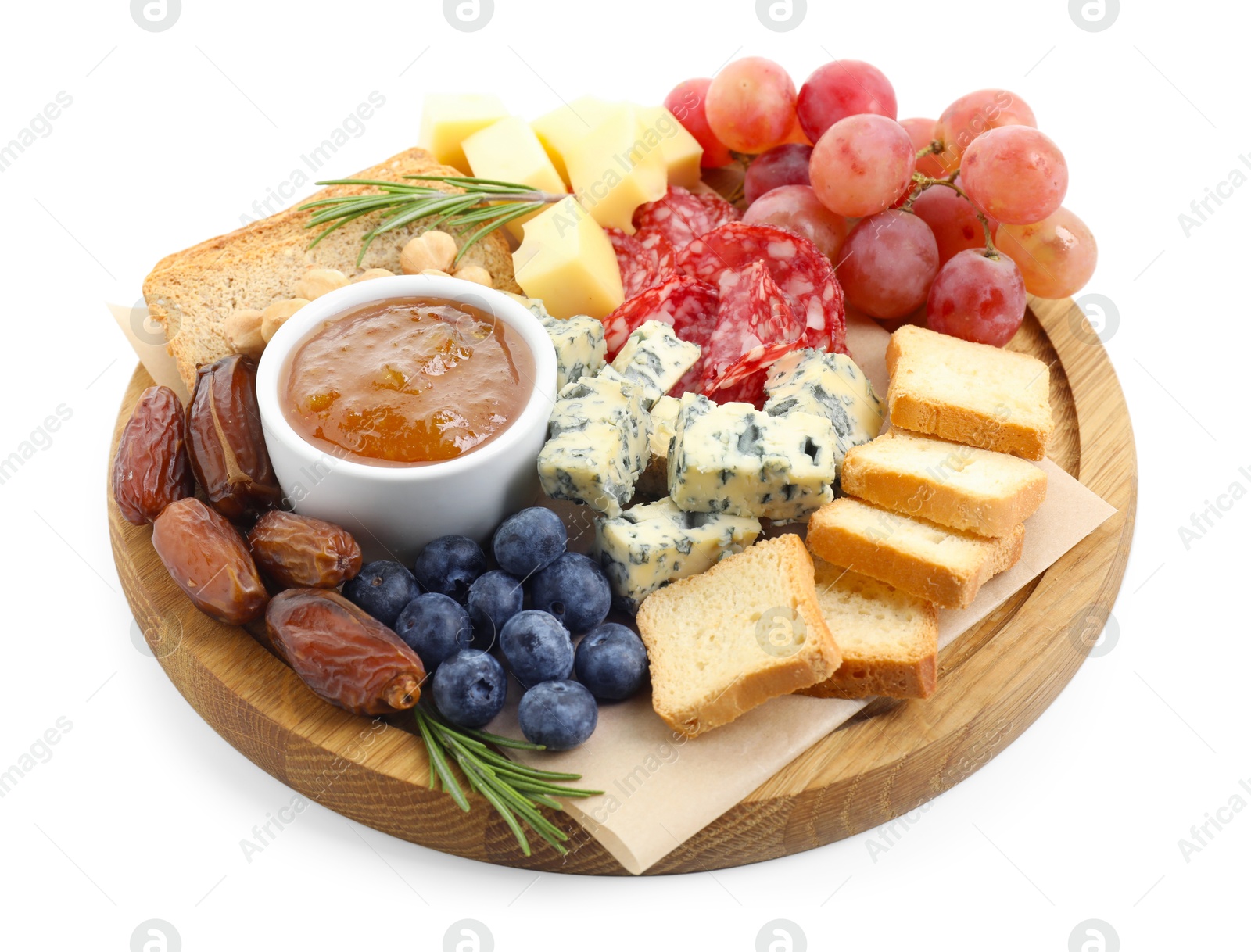 Photo of Different types of delicious cheese and other snacks isolated on white