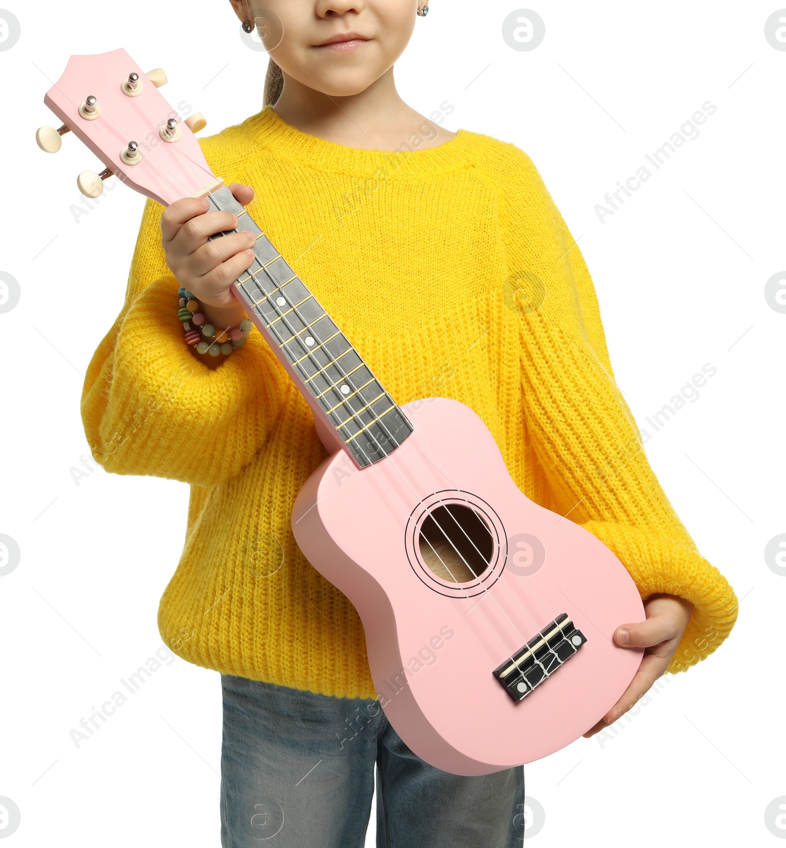 Photo of Little girl with ukulele on white background, closeup