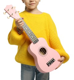 Photo of Little girl with ukulele on white background, closeup