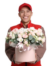 Smiling delivery man holding gift box with beautiful floral composition on white background