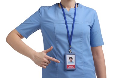 Photo of Medical assistant pointing at her badge on white background, closeup