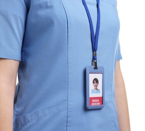 Photo of Medical assistant with badge on white background, closeup