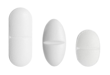 Image of Different pills in row isolated on white, set