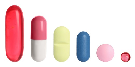 Image of Different pills in row isolated on white, set