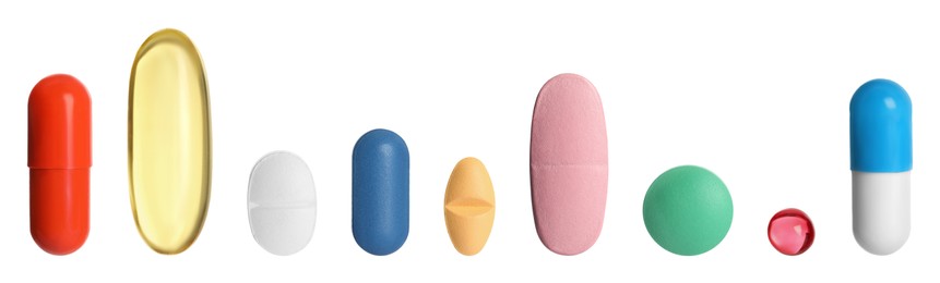Image of Different pills in row isolated on white, set