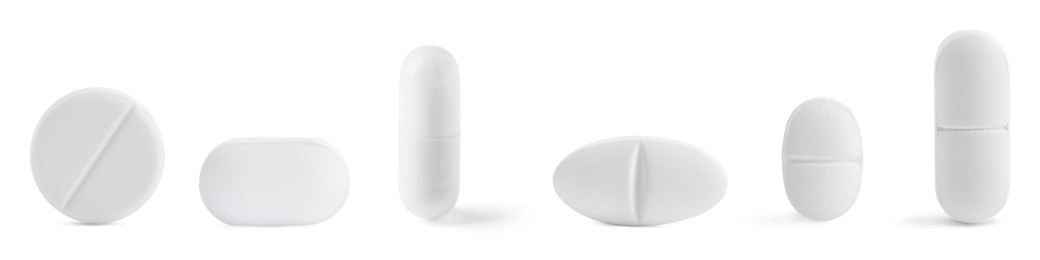 Image of Different pills in row isolated on white, set