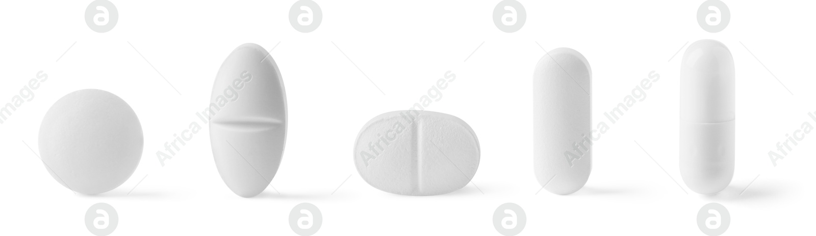 Different pills in row isolated on white, set Image of Different pills in row isolated on white, set