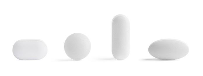 Image of Different pills in row isolated on white, set