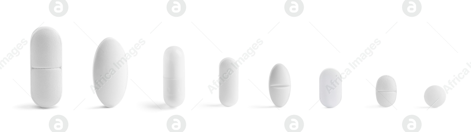 Different pills in row isolated on white, set Image of Different pills in row isolated on white, set