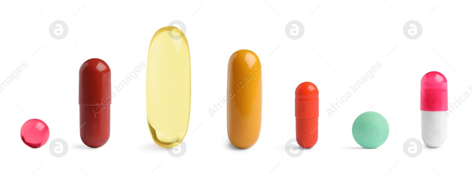 Different pills in row isolated on white, set Image of Different pills in row isolated on white, set