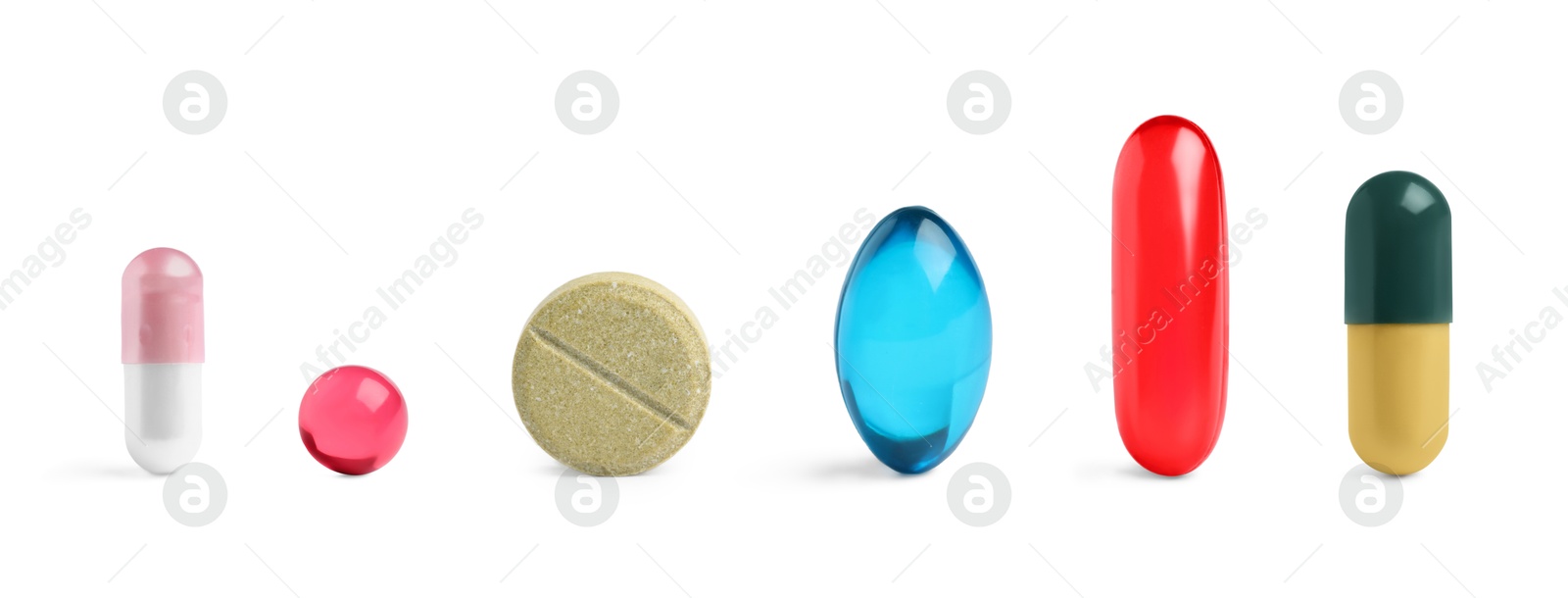 Different pills in row isolated on white, set Image of Different pills in row isolated on white, set