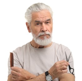 Photo of Bearded senior man holding comb and scissors on white background