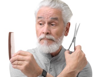 Photo of Bearded senior man with comb and scissors on white background