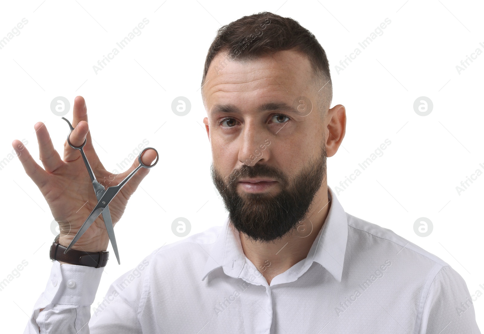 Photo of Bearded man holding scissors on white background