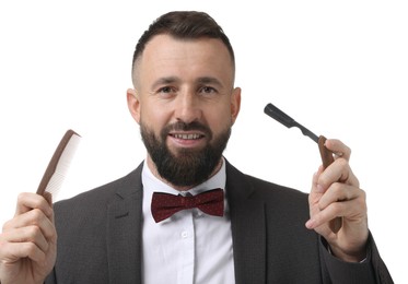 Bearded man holding blade and scissors on white background