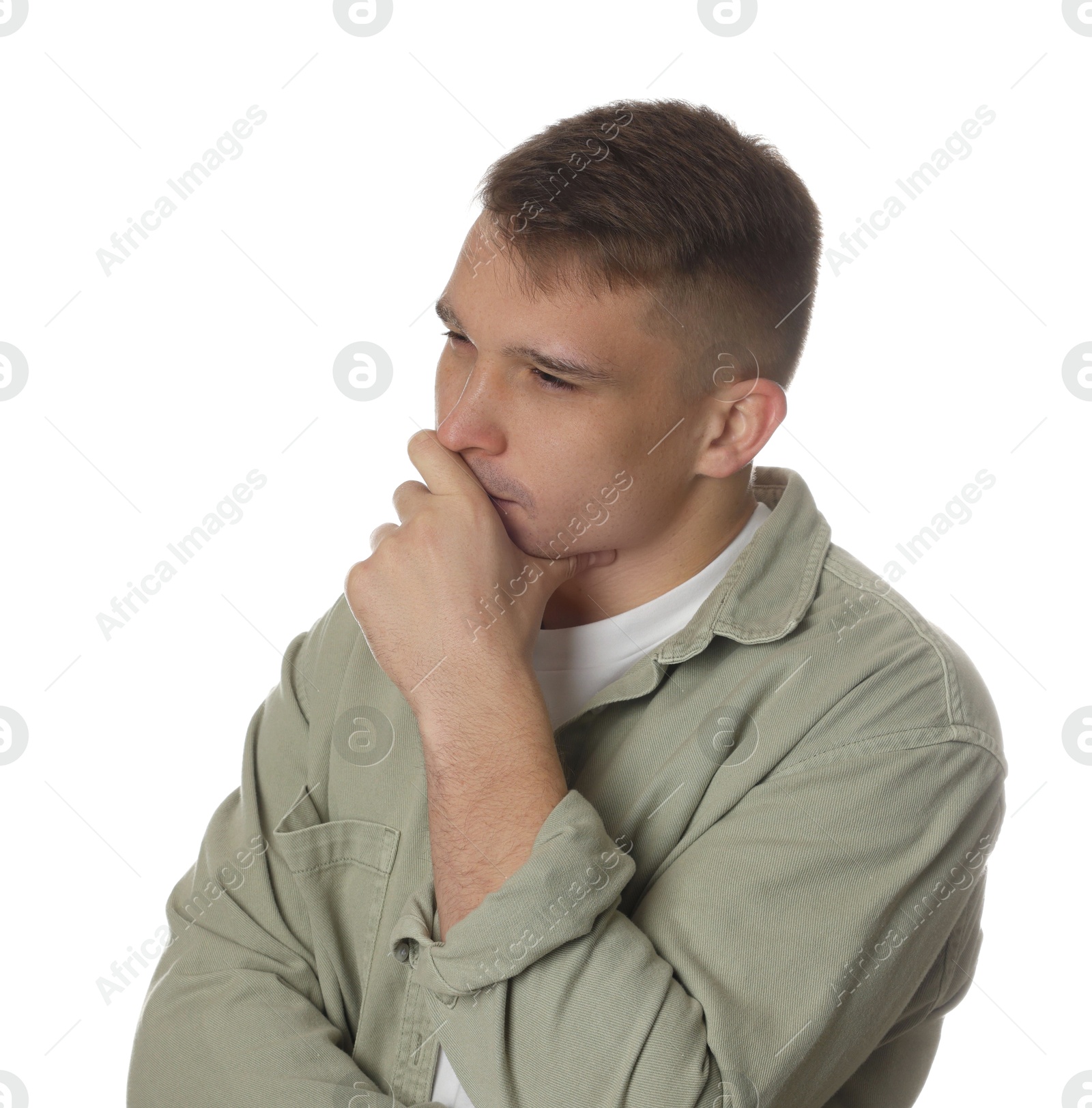 Photo of Distressed young man crying on white background