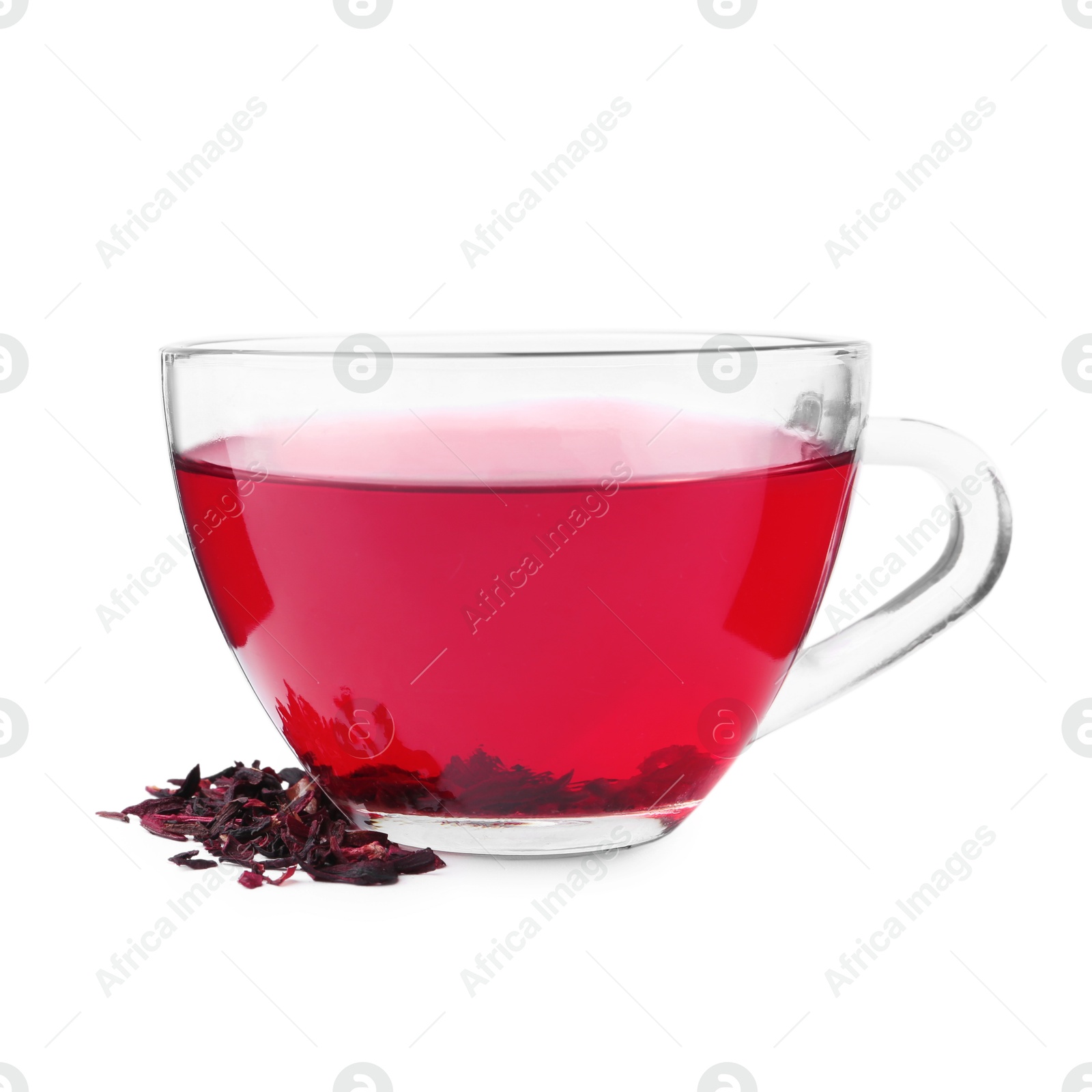 Photo of Delicious hibiscus tea in glass cup and dry roselle sepals isolated on white