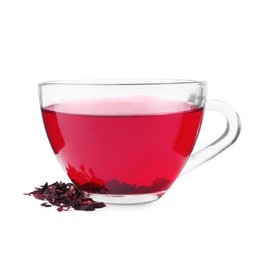 Photo of Delicious hibiscus tea in glass cup and dry roselle sepals isolated on white