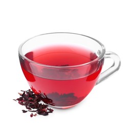 Photo of Delicious hibiscus tea in glass cup and dry roselle sepals isolated on white